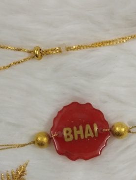Red Resin Rakhi with Lumba ( Handcrafted )